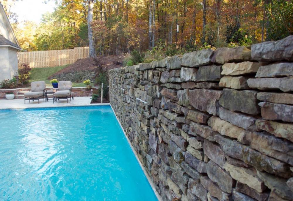 A-steady-stone-fence-at-a-house-in-the-woods